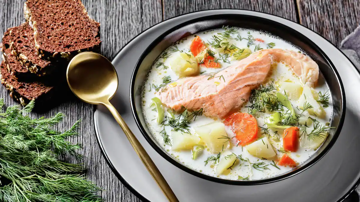 reamy Finnish salmon soup, or Lohikeitto, served with traditional rye bread